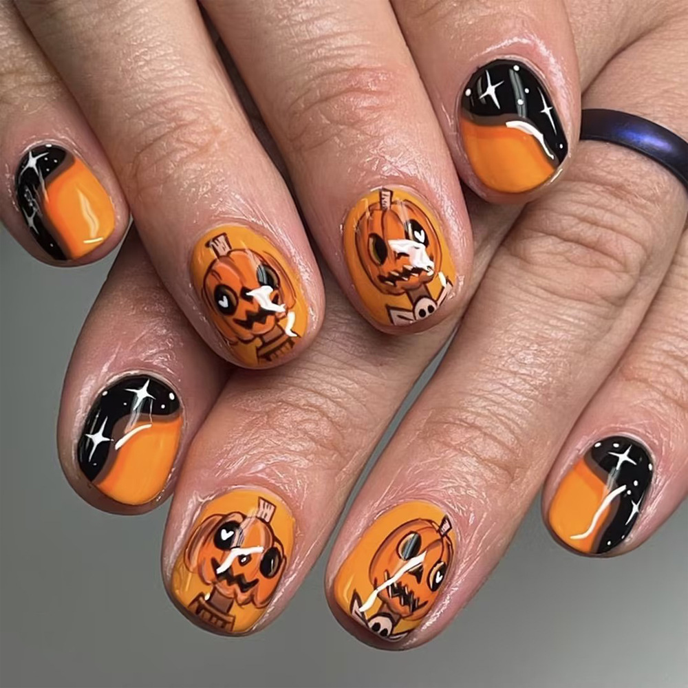 Ongles courts à coller en forme de citrouille pour Halloween