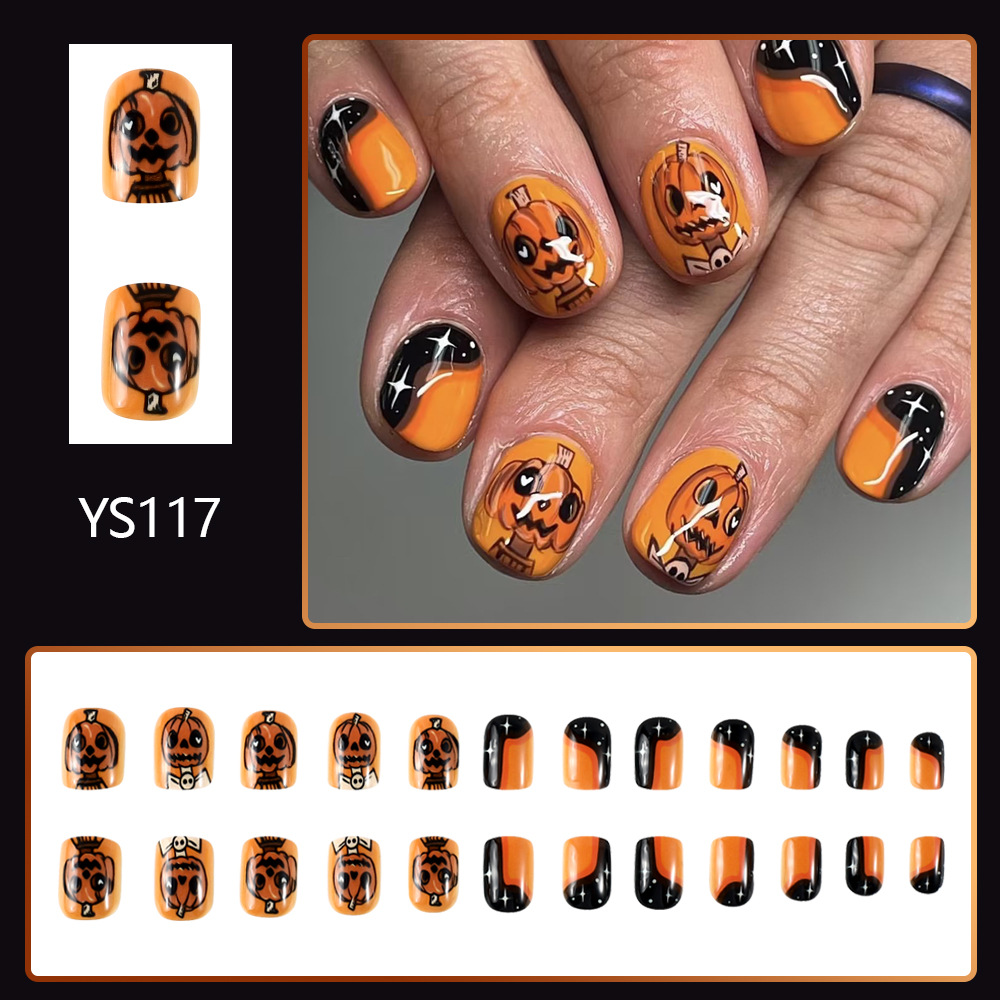 Ongles courts à coller en forme de citrouille pour Halloween